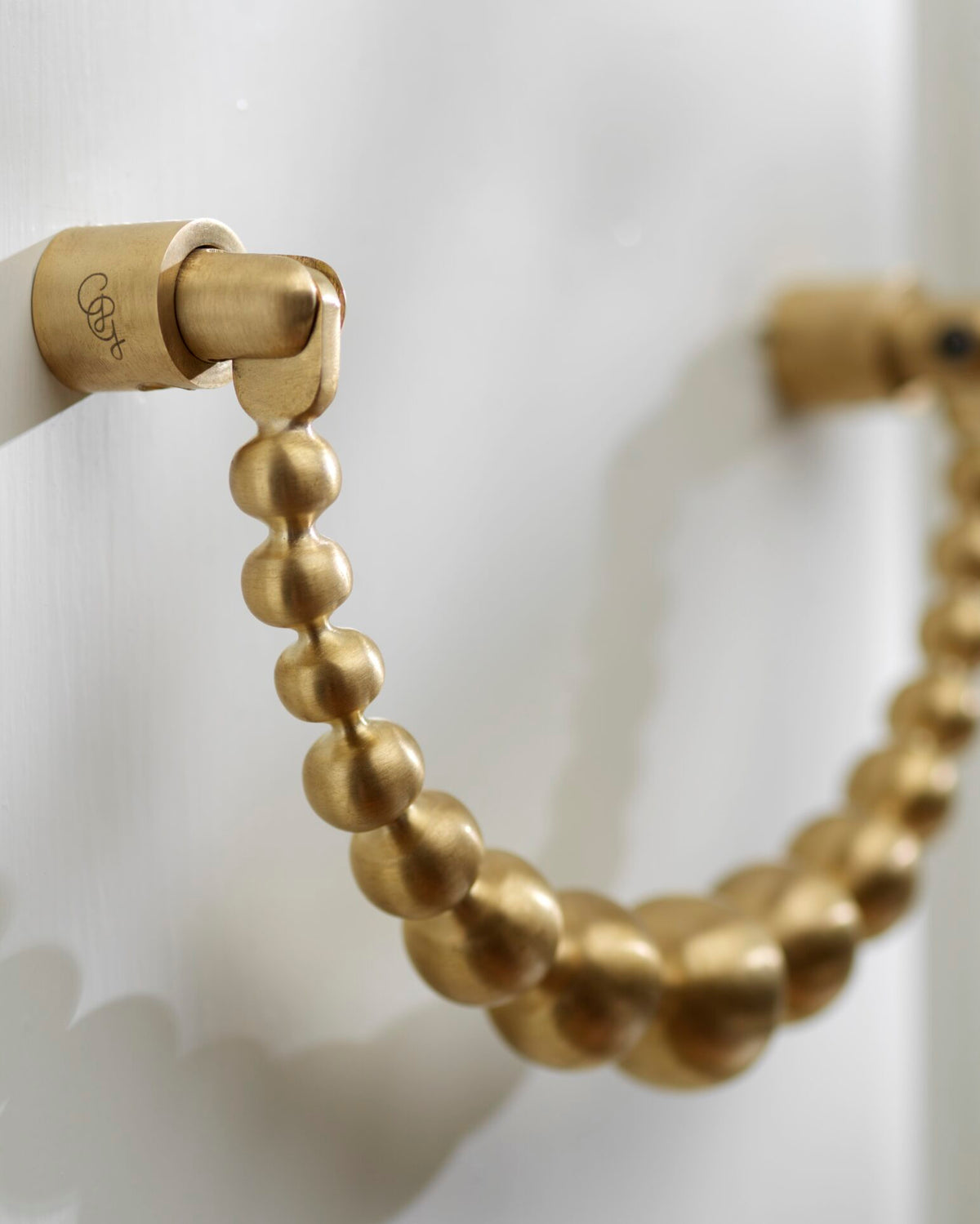door knocker gold brass