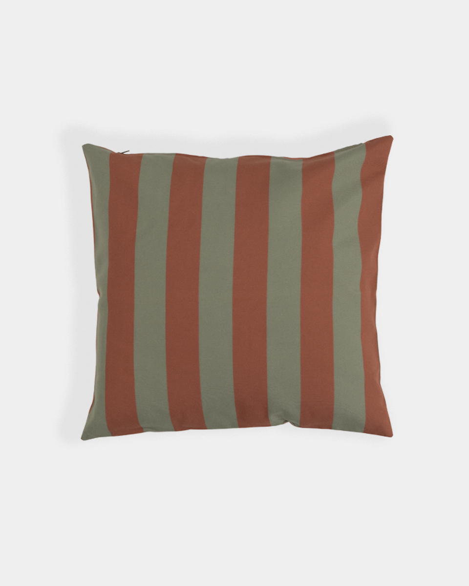 A square pillow with vertical stripes in muted terracotta red and eucalyptus green, shown against a plain light gray background.